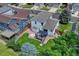 Aerial view of the home showing the roof, backyard with deck, and surrounding neighborhood at 21789 Farmingdale Way, Parker, CO 80138