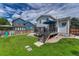 Backyard featuring a well-kept lawn and a cozy deck area perfect for entertaining and relaxing at 21789 Farmingdale Way, Parker, CO 80138