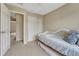 Bedroom featuring a daybed, with ample closet space, and smooth transition to hallway at 21789 Farmingdale Way, Parker, CO 80138