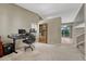 Cozy office area with a view of the staircase and backyard deck at 21789 Farmingdale Way, Parker, CO 80138