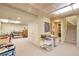 Spacious basement with storage, carpeting, adjacent stairs and a walkout at 18852 E Progress Ave, Centennial, CO 80015