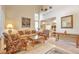 Spacious living room boasting a large window, elegant decor, and an inviting atmosphere for gatherings at 18852 E Progress Ave, Centennial, CO 80015