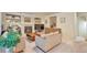 Comfortable living room boasts a fireplace, built-in shelving, and a cozy seating arrangement at 18852 E Progress Ave, Centennial, CO 80015