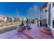 Outdoor patio with firepit, seating, and landscaped yard at 13903 Hillsboro Dr, Parker, CO 80134
