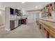 Finished basement featuring custom bar and plenty of space for entertaining guests at 13903 Hillsboro Dr, Parker, CO 80134