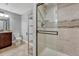 Bathroom showcasing a glass-enclosed shower and a modern vanity, combining style and functionality at 13903 Hillsboro Dr, Parker, CO 80134