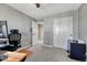 Functional bedroom space with large closet and neutral gray color palette at 13903 Hillsboro Dr, Parker, CO 80134