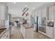 Open kitchen concept features a kitchen island, stainless steel appliances, and eat in nook at 13903 Hillsboro Dr, Parker, CO 80134