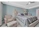 Spacious main bedroom features a tray ceiling, carpet flooring, and a sitting area at 13903 Hillsboro Dr, Parker, CO 80134