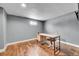 Finished basement office with wood floors and a desk at 9040 Yucca Way, Thornton, CO 80229