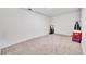 Unfinished basement storage area with carpeting at 9040 Yucca Way, Thornton, CO 80229