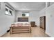Cozy bedroom with wood flooring and built-in dresser at 9040 Yucca Way, Thornton, CO 80229