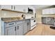 Updated kitchen featuring granite countertops and stainless steel appliances at 9040 Yucca Way, Thornton, CO 80229