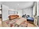 Bright living room with a fireplace and stylish furniture at 9040 Yucca Way, Thornton, CO 80229