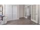 Versatile room featuring sliding door closet, and open doors that offer flexible space for any home use at 24043 E Florida Ave, Aurora, CO 80018