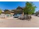 Charming home featuring an attached garage, fenced yard, and well-maintained landscaping on a sunny day at 24043 E Florida Ave, Aurora, CO 80018