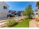 Neighborhood street featuring well-maintained homes and lush landscaping provides a welcoming community atmosphere at 24043 E Florida Ave, Aurora, CO 80018