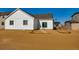 Exterior view of backyard with a sliding glass door at 274 Marlowe Dr, Erie, CO 80516