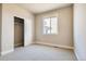 Bedroom with a window providing natural light and closet for storage at 274 Marlowe Dr, Erie, CO 80516