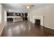 Modern kitchen with dark cabinets, granite countertops, and stainless steel appliances at 6327 Agave Ave, Castle Rock, CO 80108