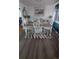 A well-lit dining area with a modern table and stylish decor at 1977 S Yates S St, Denver, CO 80219