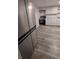 This kitchen features modern appliances, white cabinets and drawers, and hard surface countertops at 1977 S Yates S St, Denver, CO 80219