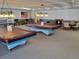 Fun recreation room with billiards, ping pong and foosball table, fireplace, and lounge seating at 544 S Xenon Ct, Lakewood, CO 80228