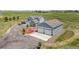 Aerial view of the stunning property with a spacious layout, detached garage, and well-maintained landscaping at 3434 Antelope Ridge Trl, Parker, CO 80138