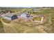 Aerial view of property with fenced backyard, pond, playground, and walking paths, creating a serene outdoor oasis at 3434 Antelope Ridge Trl, Parker, CO 80138