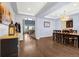 Elegant dining area boasts tray ceilings and seamlessly connects to the home's inviting living spaces at 3434 Antelope Ridge Trl, Parker, CO 80138