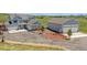 Beautiful two-story home with a three-car garage, circular driveway, and well-manicured landscaping at 3434 Antelope Ridge Trl, Parker, CO 80138