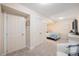 Bedroom featuring neutral carpet, closet and lots of natural light at 11781 Bradburn Blvd, Westminster, CO 80031