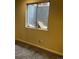 Basement window with a view of the outside at 4320 Nepal St, Denver, CO 80249