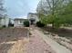 Inviting front yard with walkway leading to the front door at 4320 Nepal St, Denver, CO 80249
