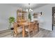 Dining room with wooden table and hutch at 6352 E Mississippi Ave, Denver, CO 80224