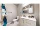 Basement bathroom with shower/tub and modern vanity at 10722 E 162Nd Pl, Brighton, CO 80602