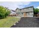 Spacious backyard with deck, mulch and a large grassy area at 2588 E 116Th Ave, Thornton, CO 80233