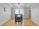Dining room with modern lighting and hardwood floors at 2588 E 116Th Ave, Thornton, CO 80233