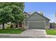 Charming two-story home with a large two-car garage and mature landscaping at 2588 E 116Th Ave, Thornton, CO 80233