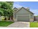 Charming home with a two-car garage, well-maintained lawn, mature tree, and inviting curb appeal at 2588 E 116Th Ave, Thornton, CO 80233