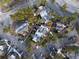 Overhead shot showcasing the layout of the condo complex, parking, and surrounding landscape at 1179 Ski Hill Rd # 147, Breckenridge, CO 80424