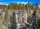 Aerial exterior view reveals complex design, roof lines, and the surrounding landscape at 1179 Ski Hill Rd # 147, Breckenridge, CO 80424