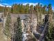 Aerial exterior view reveals complex design, roof lines, and the surrounding landscape at 1179 Ski Hill Rd # 147, Breckenridge, CO 80424