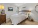 Inviting bedroom features cozy bedding, a neutral color palette, and a bright window with views of the outdoors at 1179 Ski Hill Rd # 147, Breckenridge, CO 80424