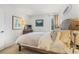 Bright bedroom with plush bedding, natural light from the window, and a peaceful atmosphere for relaxation at 1179 Ski Hill Rd # 147, Breckenridge, CO 80424