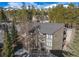 Condo building with balconies, a modern metal roof, and views of the snowy mountains at 1179 Ski Hill Rd # 147, Breckenridge, CO 80424