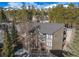 Condo building with balconies, a modern metal roof, and views of the snowy mountains at 1179 Ski Hill Rd # 147, Breckenridge, CO 80424