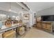 Well-equipped kitchen with gray cabinets, stylish backsplash, and breakfast bar seating area at 1179 Ski Hill Rd # 147, Breckenridge, CO 80424