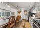Bright kitchen features modern appliances and decor with an open dining area and comfortable living space at 1179 Ski Hill Rd # 147, Breckenridge, CO 80424