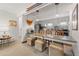 Modern kitchen with stainless steel appliances, mosaic tile backsplash, and gray cabinetry at 1179 Ski Hill Rd # 147, Breckenridge, CO 80424